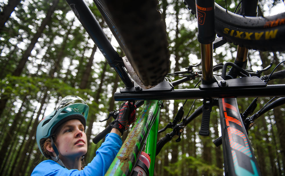 Rider checking the fork cradle under a loaded rack