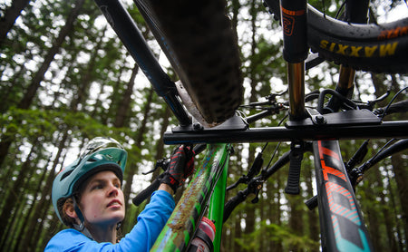 Rider checking the fork cradle under a loaded rack